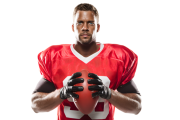 Portrait of American football player in red jersey holding ball against white background