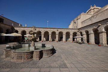 The Claustros de la Compañía showcase elegant colonial architecture carved from white volcanic...
