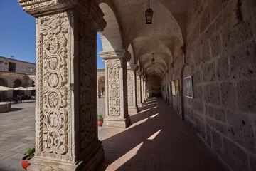 The Claustros de la Compañía showcase elegant colonial architecture carved from white volcanic...