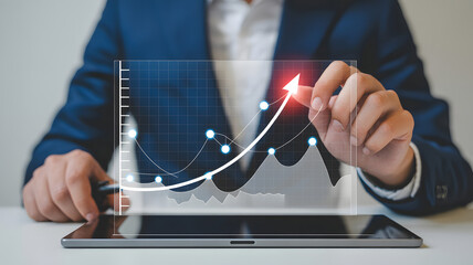 Businessman analyzing financial data with growth graph for success