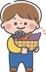 秋の味覚がいっぱい入ったかごを持つ男の子