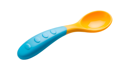 Baby food spoon shines brightly in studio shot, isolated on black background, food concept