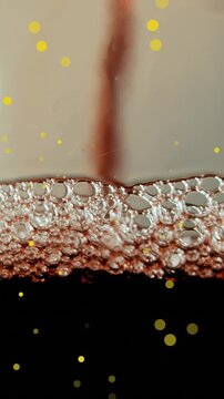 Animation of spots at christmas and glass of wine