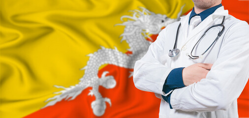 Bhutan healthcare concept. Male doctor on Bhutan flag. Doctor with crossed arms on Bhutan flag