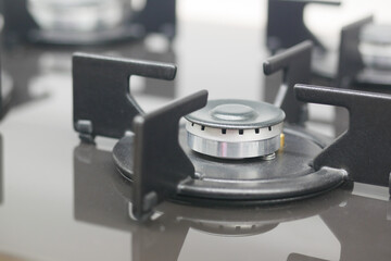 Gas stove ready to cook on modern countertop
