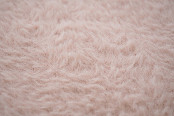 Soft textured pink fabric on a cozy surface