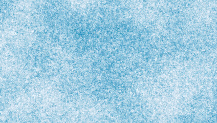 Grainy blue texture background with soft snowy effect. Abstract rough surface reminiscent of winter frost or snowfall. Ideal for seasonal design, backgrounds, posters and prints.