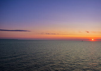 Fototapeta premium vibrant sunset over the Baltic Sea off the coast of Riga, Latvia