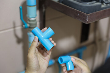 Plumbers choose water pipe connectors joint to repair leaking plumbing water pipes.