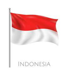 The national flag of Indonesia waving proudly on a silver flagpole.