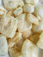 Puffed and Crispy Beef Skin Snack on a Plate