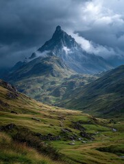 Fototapeta premium Mountain peak pierces storm clouds. Lush valley
