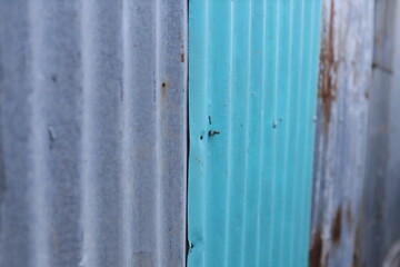 Close-up of rusty zinc texture with natural corrosion patterns.Old Zinc wall rust background or texture.