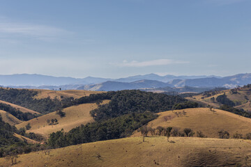 beautiful view to green mountains in cunha in sao paulo. blue sky and green vegetation