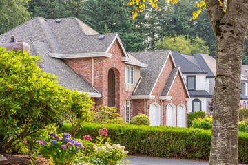 Two story luxury house with beautiful summer  landscape in Vancouver, Canada, North America. Day time on August 2025.
