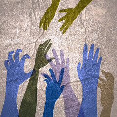 Human hands reaching out to one another, almost touching. Help concept