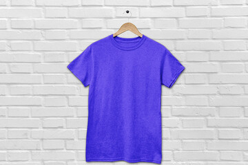 Hanging T-Shirt Mockup On The Wall