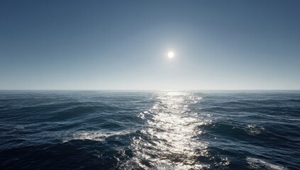 Vast ocean stretches to a bright sun