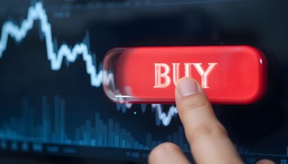 A finger presses a red buy button on a screen displaying a financial stock market graph chart line