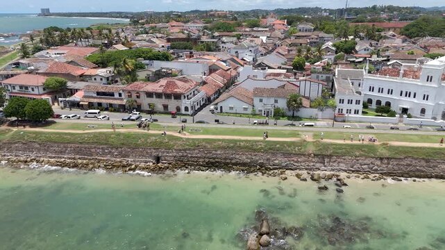 4K drone footage showcasing Galle Fort and the beautiful Sri Lankan coastline showcasing the historic streets, the iconic lighthouse, and sweeping ocean views from above.