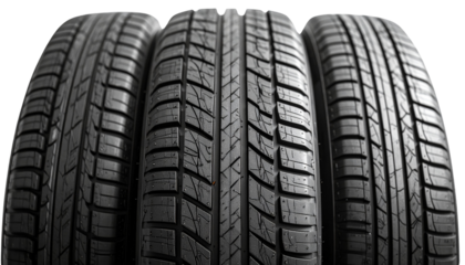 New black rubber automobile tire with a distinct tread pattern, isolated on a white background