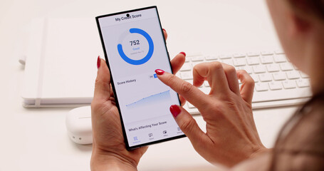 Financial Success: Woman Touching Smartphone