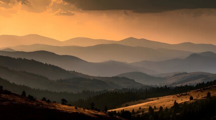 Layered mountain ranges at sunset.
