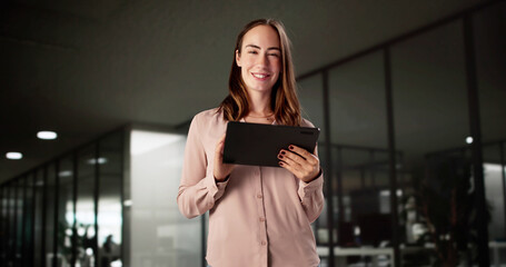 Young Caucasian Woman Using Tablet For Online Financial Services