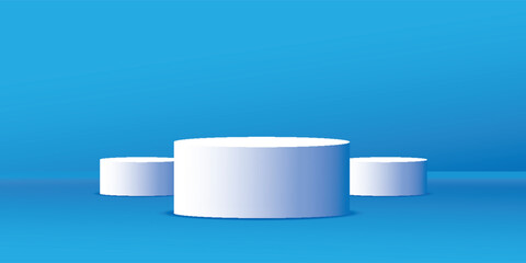 Minimal 3D podium display with three white cylindrical platforms on a blue gradient background, perfect for product presentation or advertisement design.