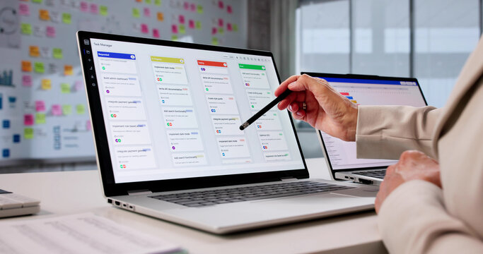 Busy Businesswoman Managing Projects And Schedules With Kanban Software