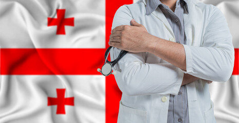 Doctor with stethoscope on arm with Georgia flag behind. National health system of Georgia, concept