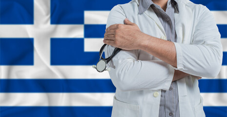Doctor with stethoscope on arm with Greece flag behind. National health system of Greece, concept