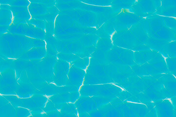 Blue water with ripples on the surface. Defocused, blurred, transparent, blue, clean, calm water...