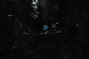Close up shot of water splashing on black background