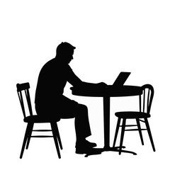 Focused individual using laptop at dining table, productivity concept