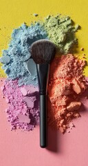 Colorful eyeshadow and brush on a vibrant background