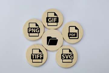 blue wooden square with formats file icons. the most common file formats and discuss what makes...