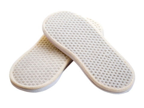Pair of white orthopedic insoles for shoes, isolated on transparent background