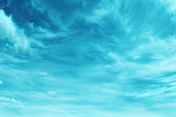 A vast, textured expanse of light teal and azure clouds
