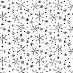 Black and white seamless pattern with hand drawn snowflakes and dots. Winter background for Christmas.