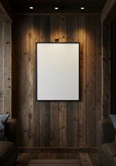 A blank vertical poster mockup with a black frame on a rustic wooden wall, illuminated by spotlights in a cozy interior.