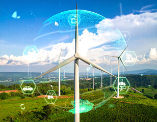 Wind turbines generating clean energy on a green hillside, with digital overlay.