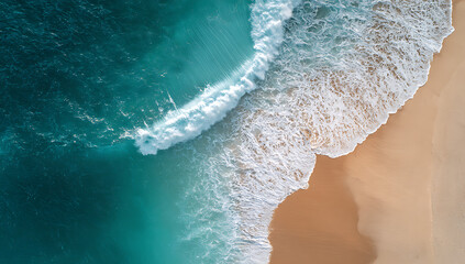 Aerial view of turquoise ocean waves crashing on a sandy beach water 1