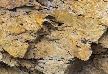 the structure of the rock surface in the section, quarrying in the natural environment, sunny day