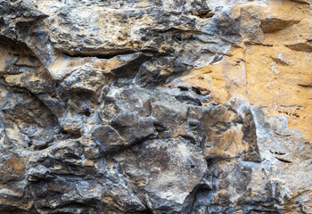 the structure of the rock surface in the section, quarrying in the natural environment, sunny day