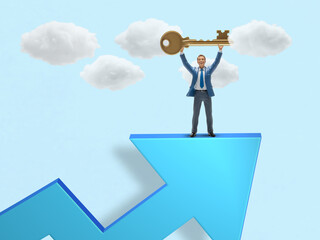 A small businessman stands atop a rising blue arrow, triumphantly holding up a large golden key....