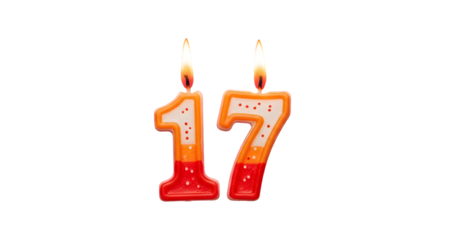 Illuminated number seventeen candles with orange and red details on a black background scene view