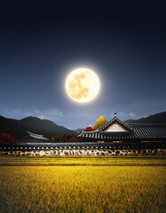 Korean traditional holiday Chuseok banner background, a bountiful Chuseok thank you card background with an autumn full moon, a hanok tile-roofed house, and ears of rice.

