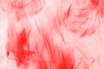 Abstract fiery red and black textured background with streaks of light and shadow creating a...