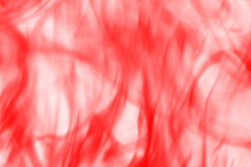 Vibrant abstract red flames dance with dark shadows creating a fiery and intense visual experience